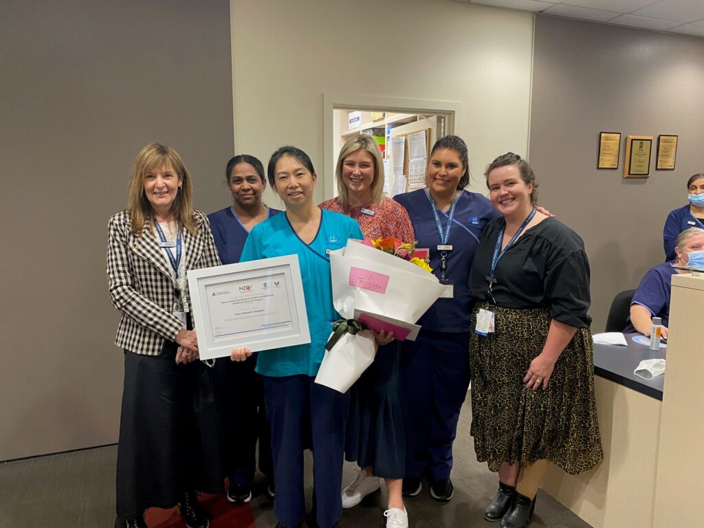 Deb Boyd (Ormiston Hospital CEO) and team celebrating an HCA team member on her recent qualification.