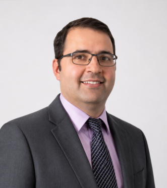 Dr Muammar Abu-Serriah, specialist oral & maxillofacial surgeon working at Ormiston Hospital